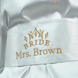 a close up of a bride&#39;s dress with a name on it