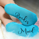 a pair of blue bride and maid slippers