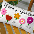 a personalized pillow with flowers on it