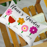 a personalized pillow with flowers on it