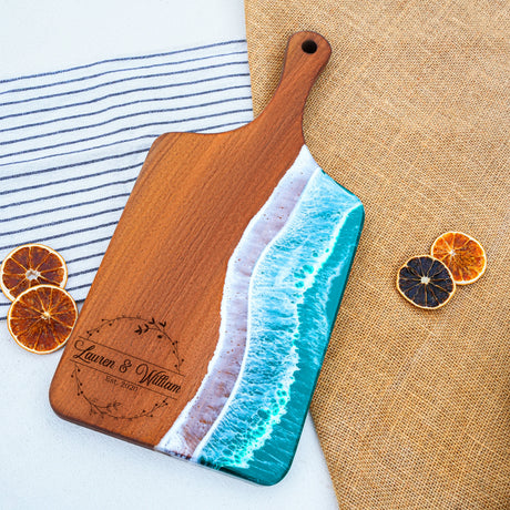 a wooden cutting board sitting on top of a table