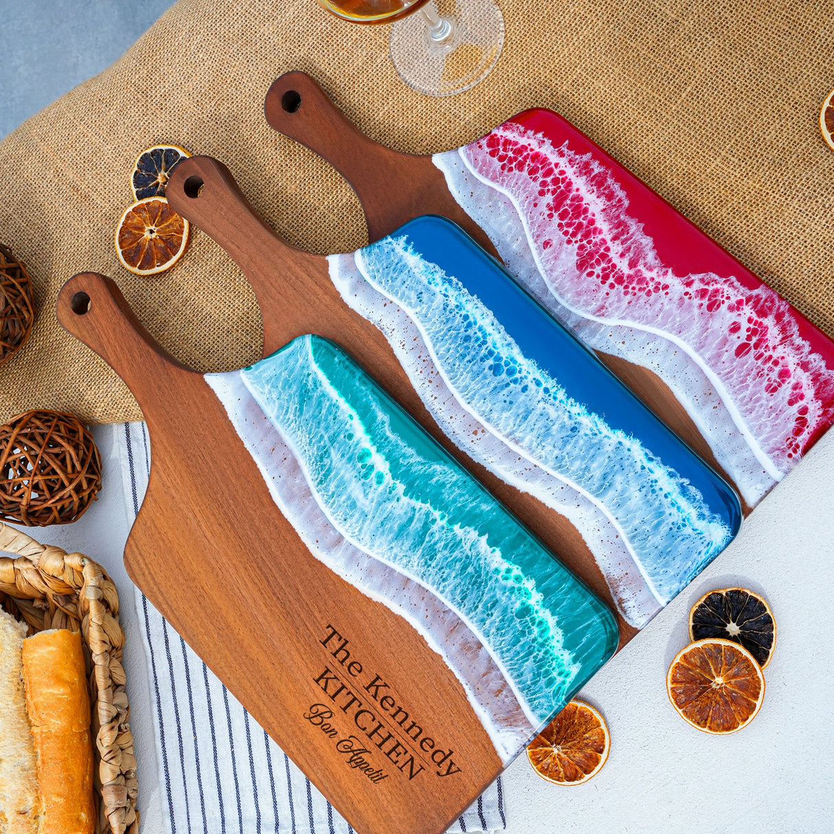 a couple of cutting boards sitting on top of a table