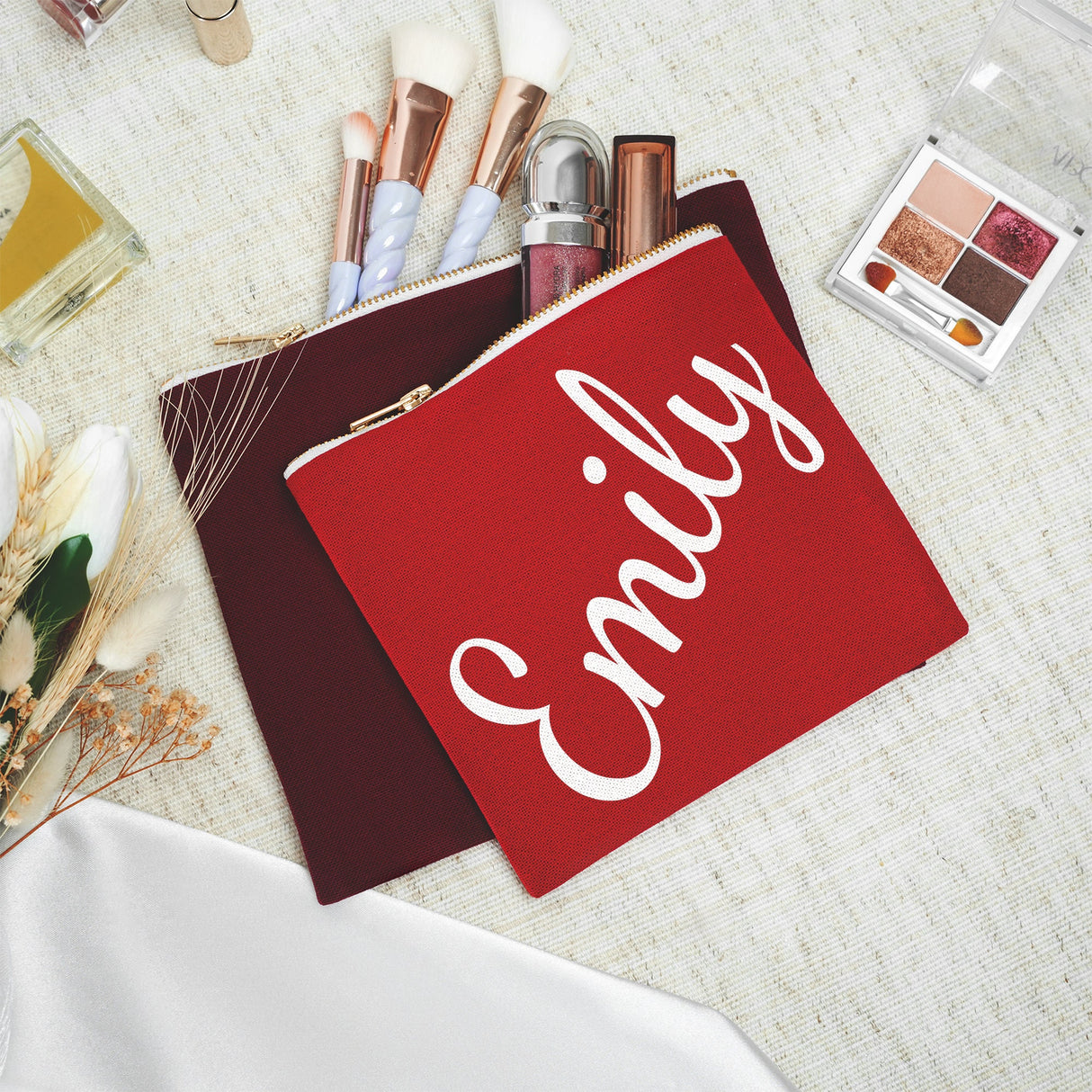 a red bag with a name on it sitting on a table