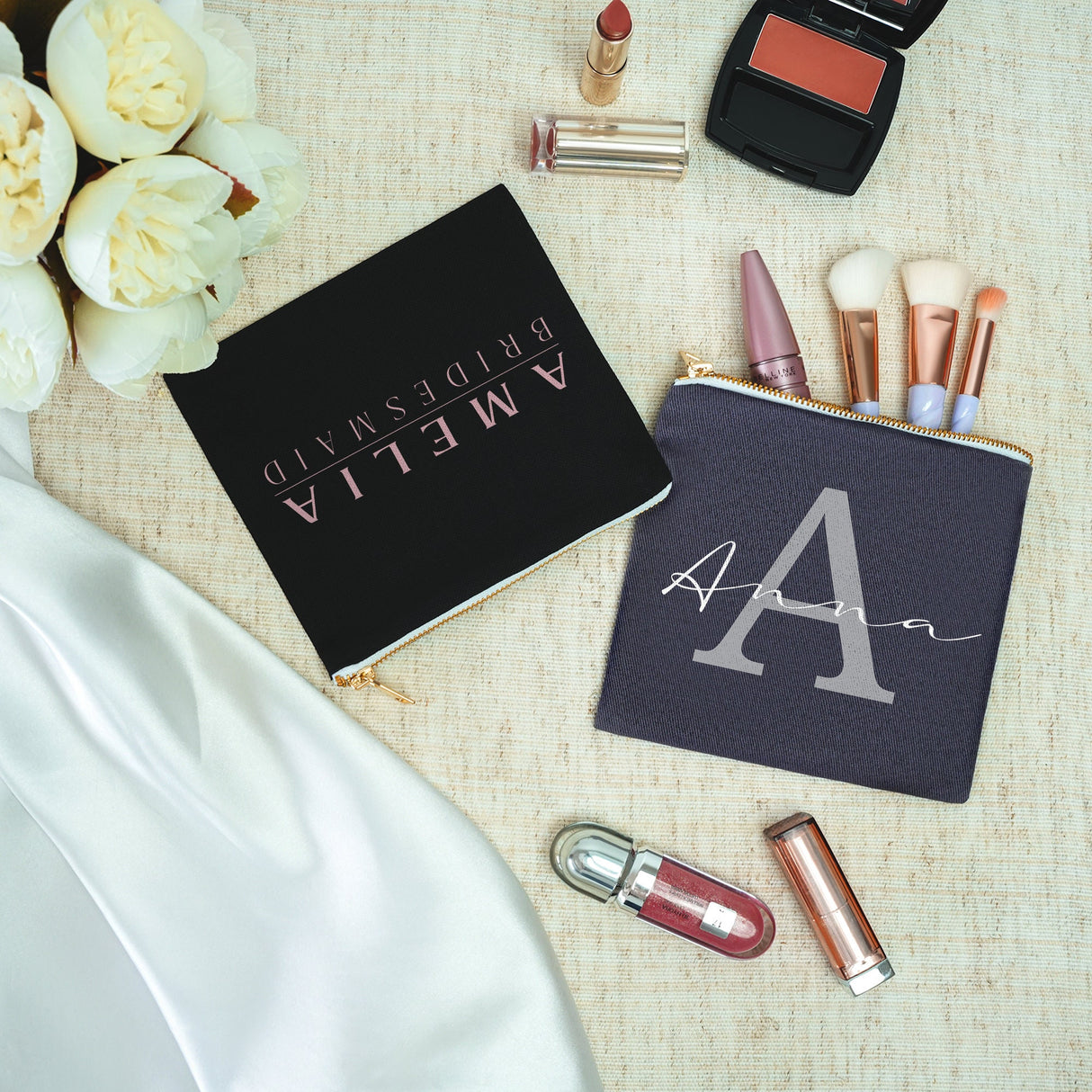 a table topped with makeup and a book