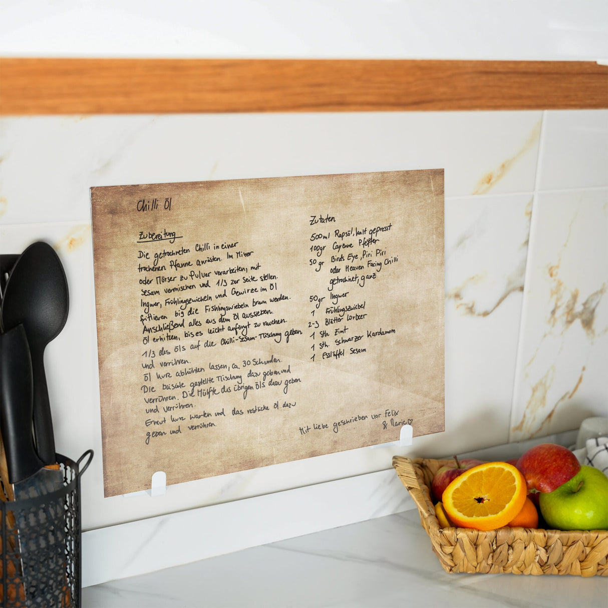 a kitchen counter with a basket of fruit on it