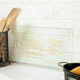 a basket of wooden utensils sitting on a counter