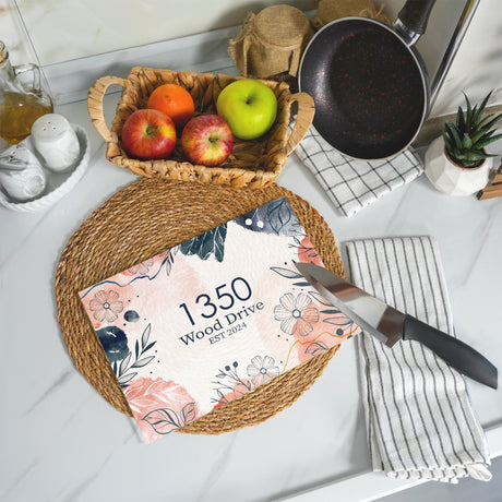 a table with a basket of fruit and a cookbook