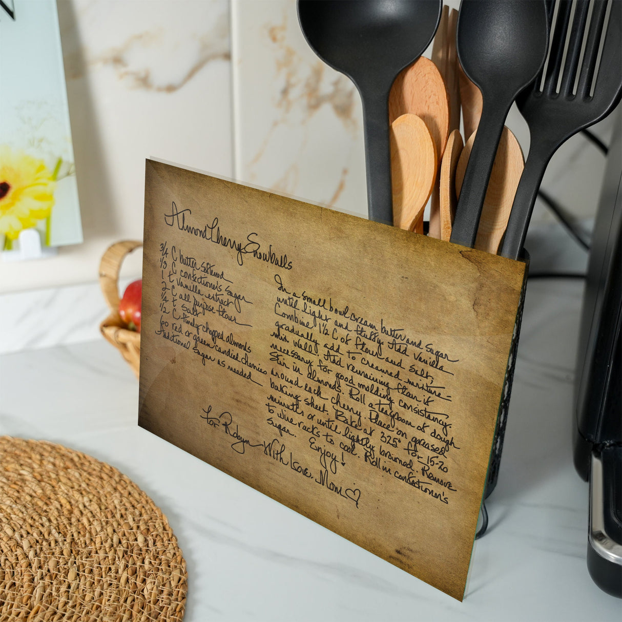 a table with utensils and a sign on it