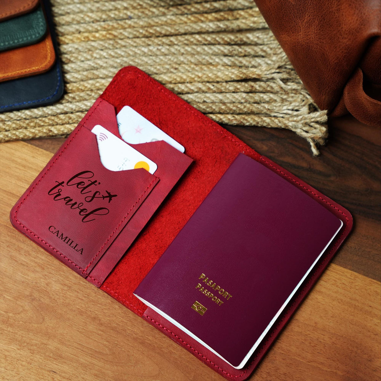 a passport and a passport case sitting on a table