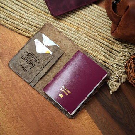 a passport sitting on top of a wooden table