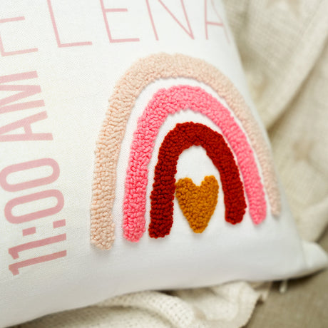 a close up of a pillow on a bed