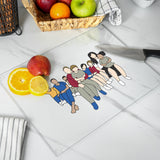 a cutting board with a picture of people on it