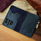 a wallet sitting on top of a wooden table