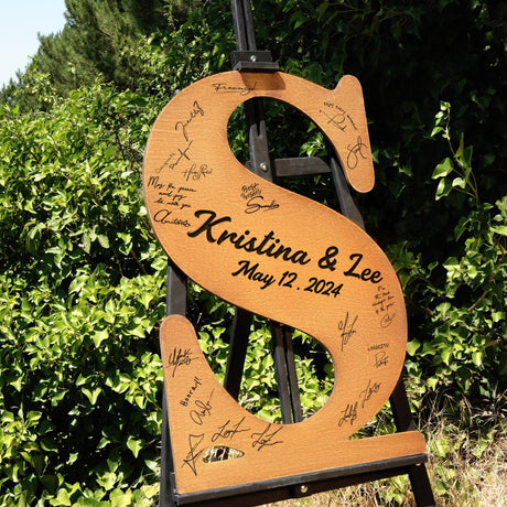 a wooden sign that has writing on it