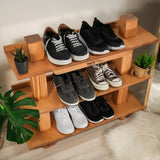 a couple of shelves that have some shoes on them