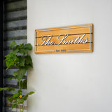 a wooden sign that says the smiths on it