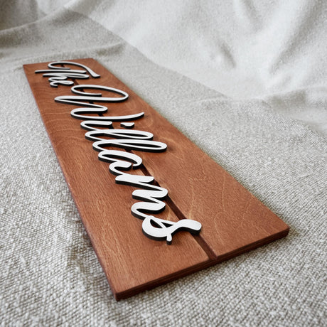 a wooden sign that says welcome to someone