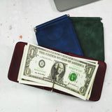 a wallet with a dollar bill sticking out of it