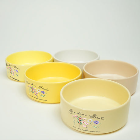 a group of four bowls sitting next to each other