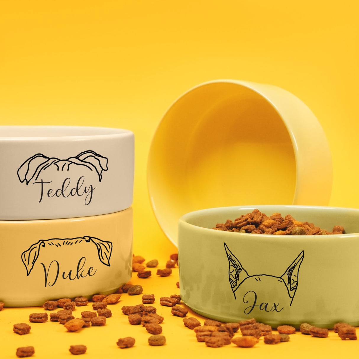 three bowls of dog food on a yellow background