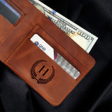 a wallet with money sticking out of it