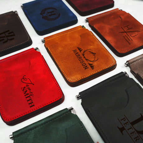 a group of wallets sitting on top of a table