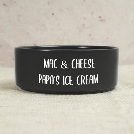 a black bowl that says mac and cheese papa&#39;s ice cream