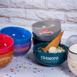 a table topped with bowls filled with ice cream