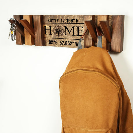 a coat rack with a coat hanging on it