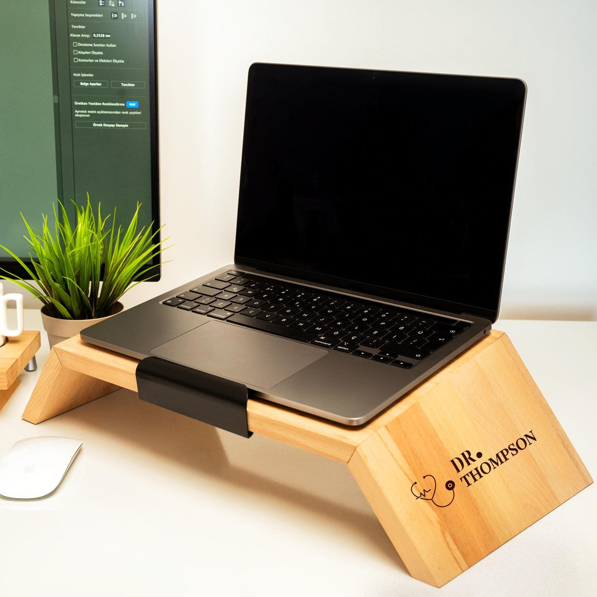 a laptop computer sitting on a wooden stand