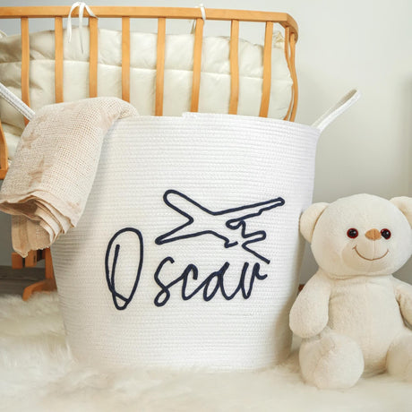 two stuffed animals in baskets on a white rug