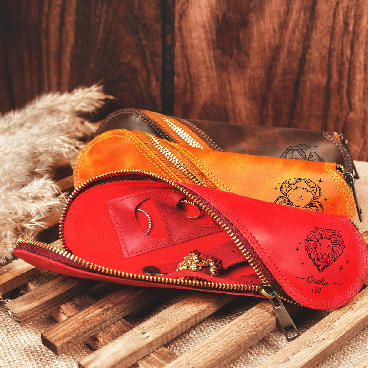 a woman holding a red purse with several rings in it