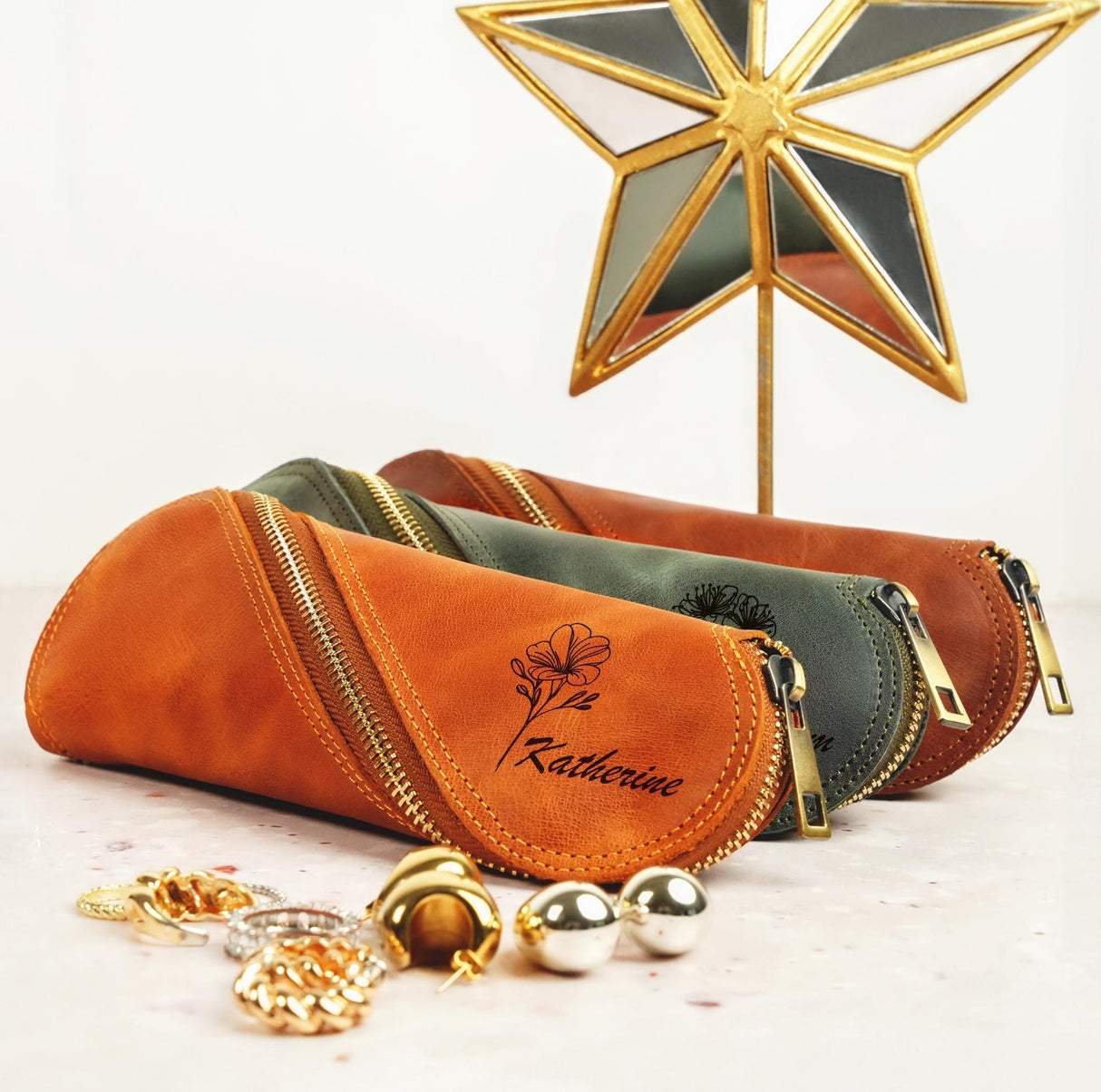 three small purses sitting next to each other on a table