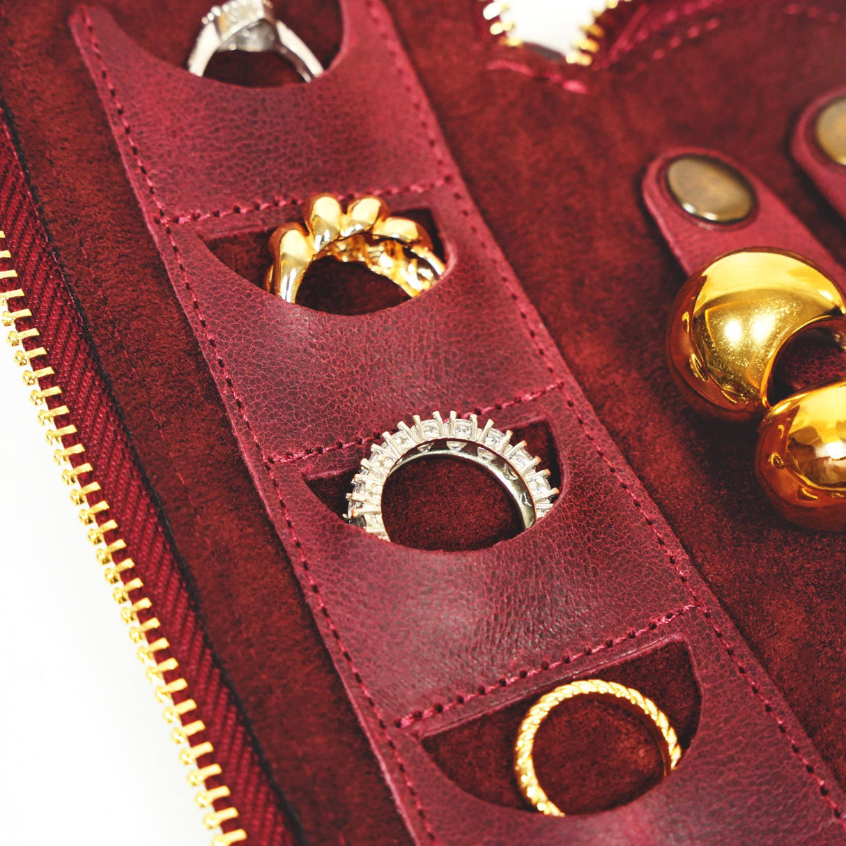 a close up of a red case with bells