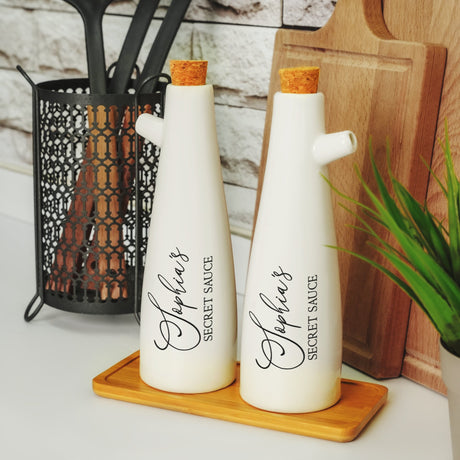 a couple of bottles sitting on top of a wooden tray