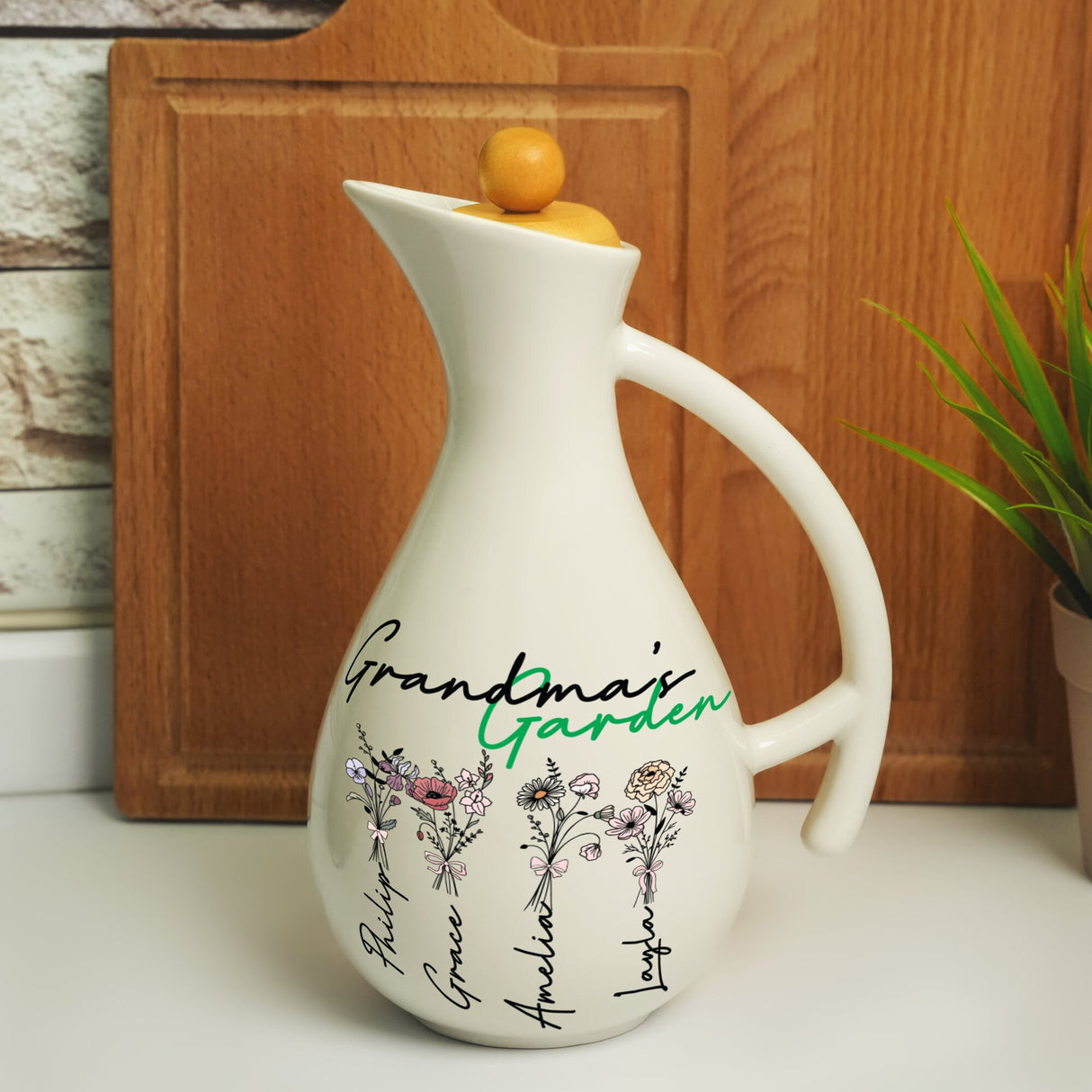 a white vase with a picture of flowers painted on it