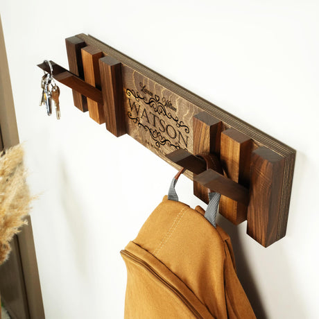 a coat rack with a coat hanging on it