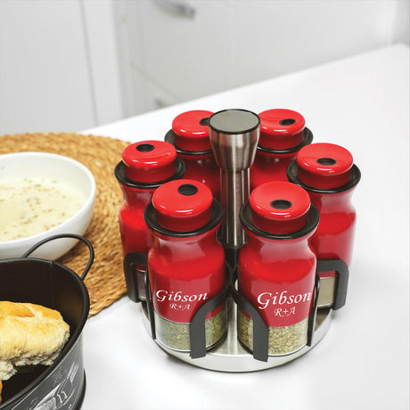 a group of red bottles sitting on top of a counter