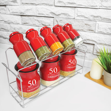 a shelf with spices and a potted plant