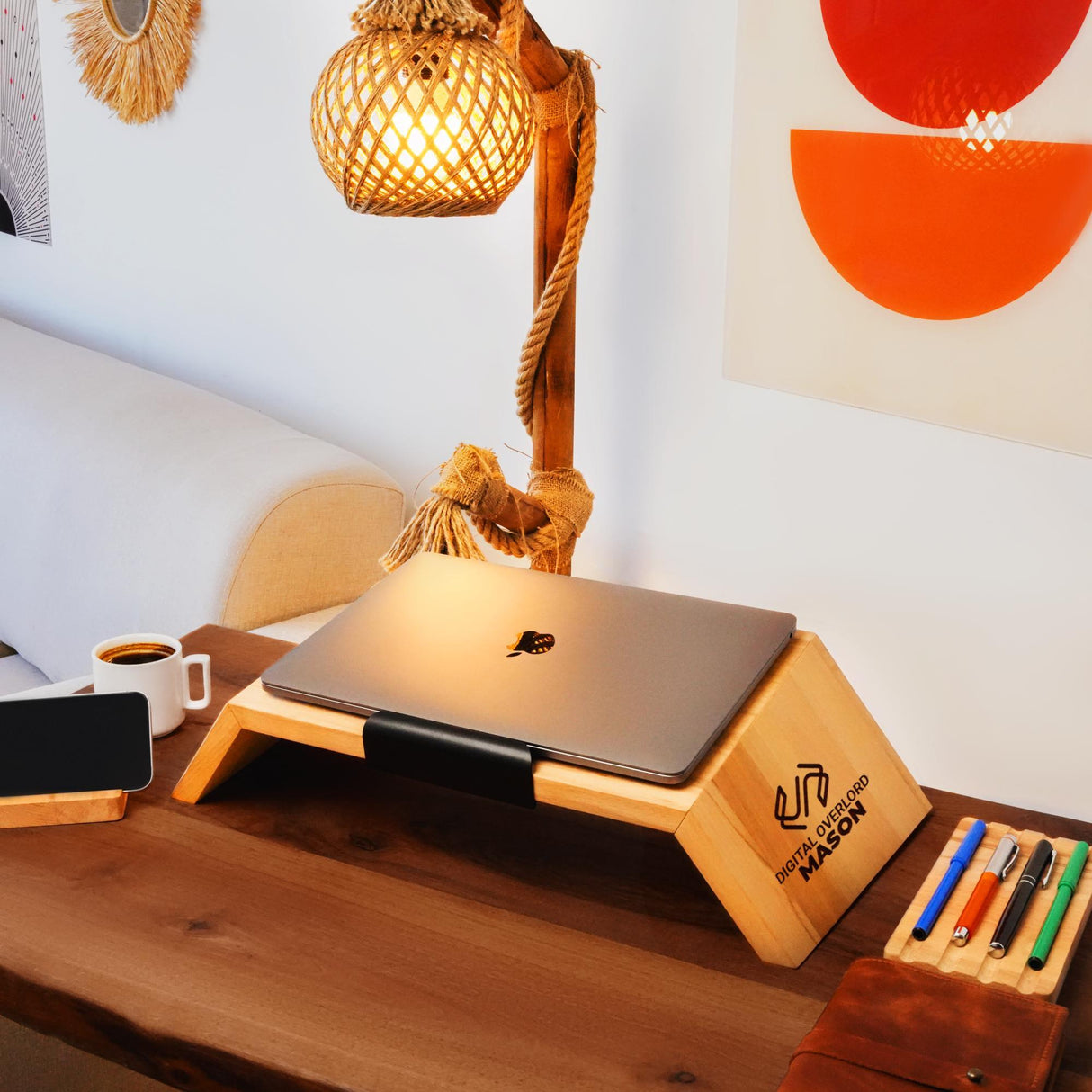 a wooden desk with a laptop on top of it