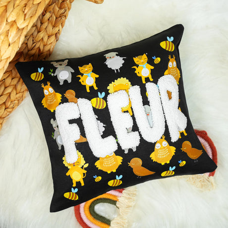 a black pillow with the word flup on it