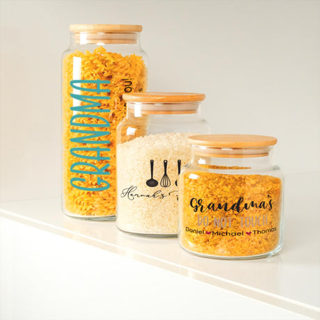 three glass jars filled with yellow and white rice