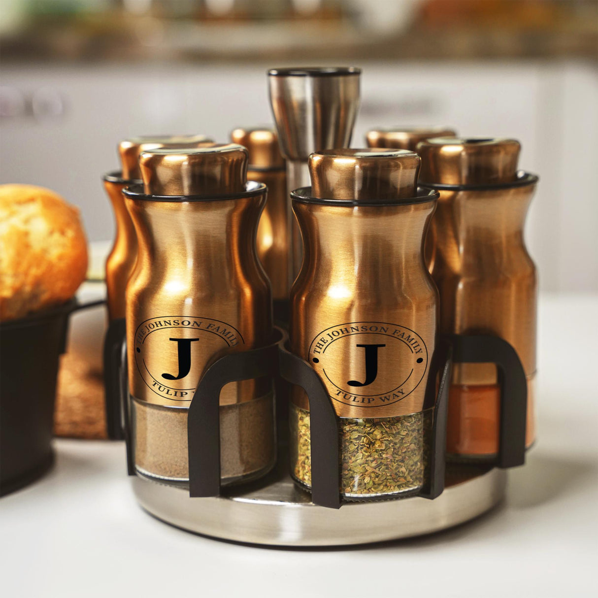 a set of spice dispensers sitting on a counter